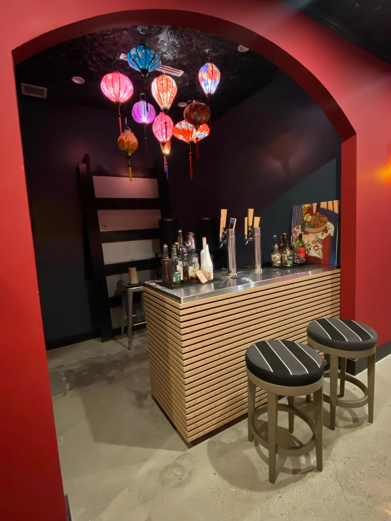 The Speakeasy bar, under silk lanterns